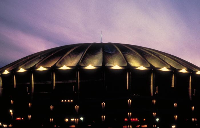 The Kingdome roof lit up at dusk